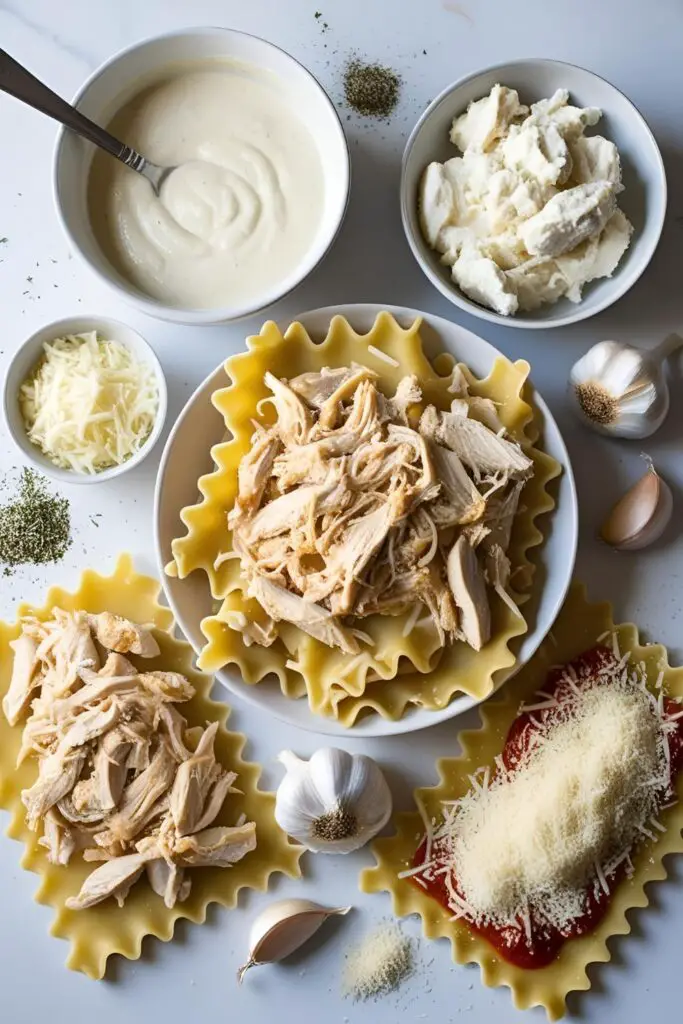 Close-up of Chicken Alfredo Lasagna Roll-Ups with melted cheese and creamy sauce.