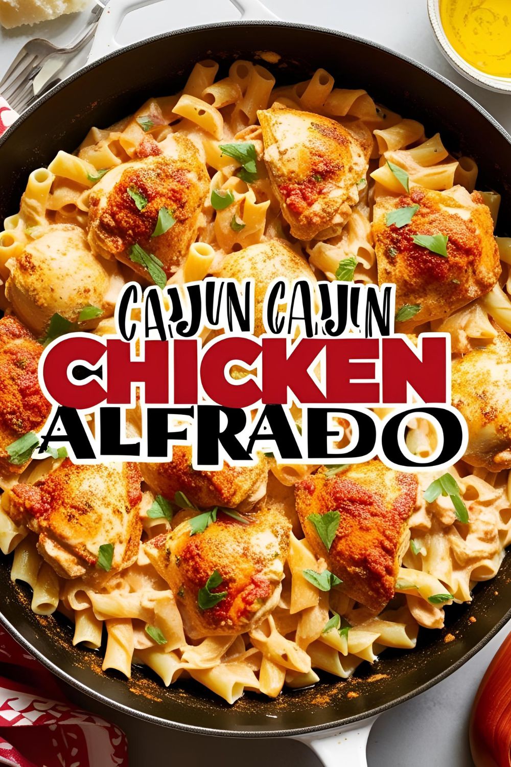 A skillet filled with creamy Cajun Chicken Alfredo garnished with fresh parsley.