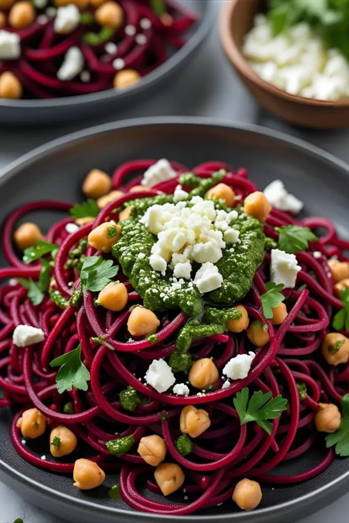 Close-up of beet noodles twirled on a fork over a colorful salad bowl.
Enjoy twirling into vibrant healthiness, chef!