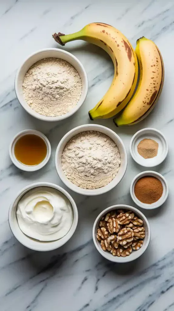 Close-up of a slice of healthy banana bread showing texture and oats.
