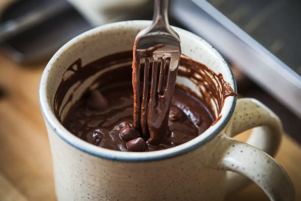 Mixing brownie batter in a mug